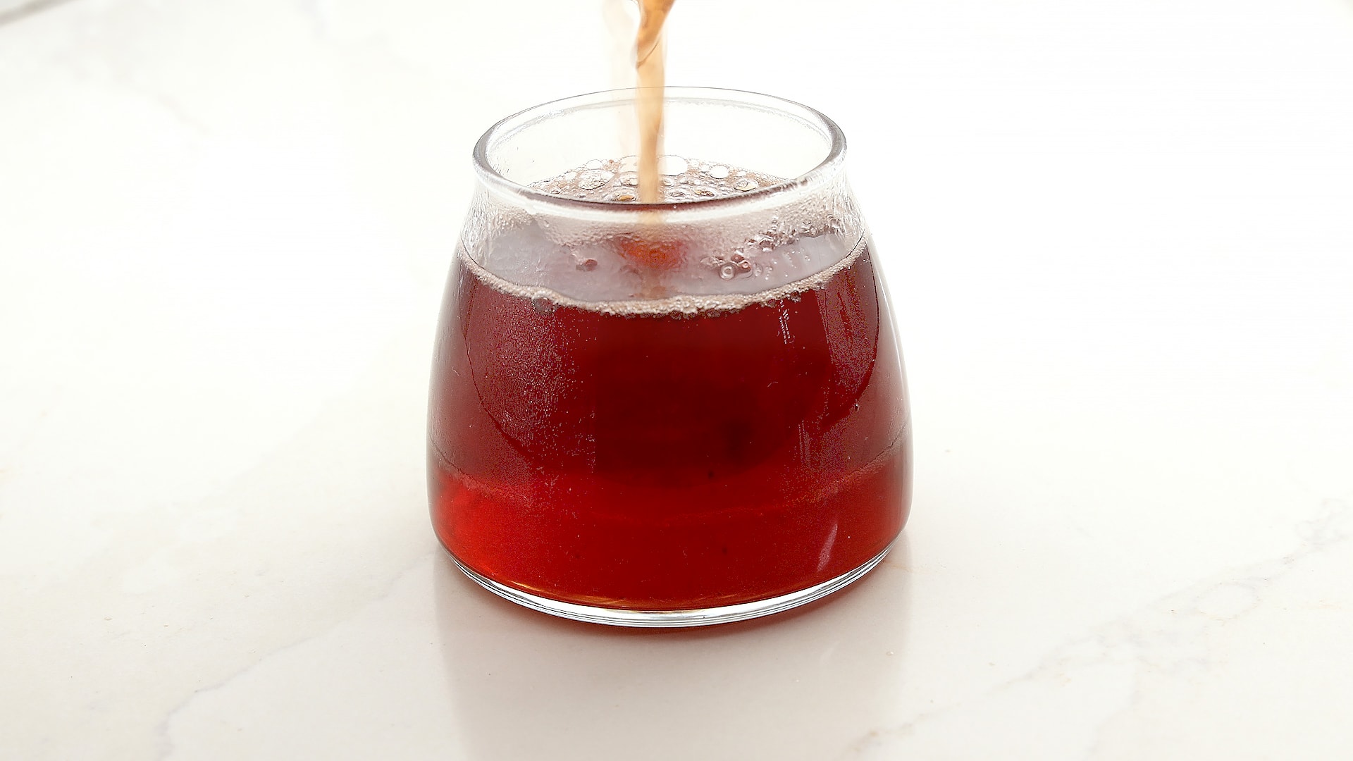Pouring syrup.