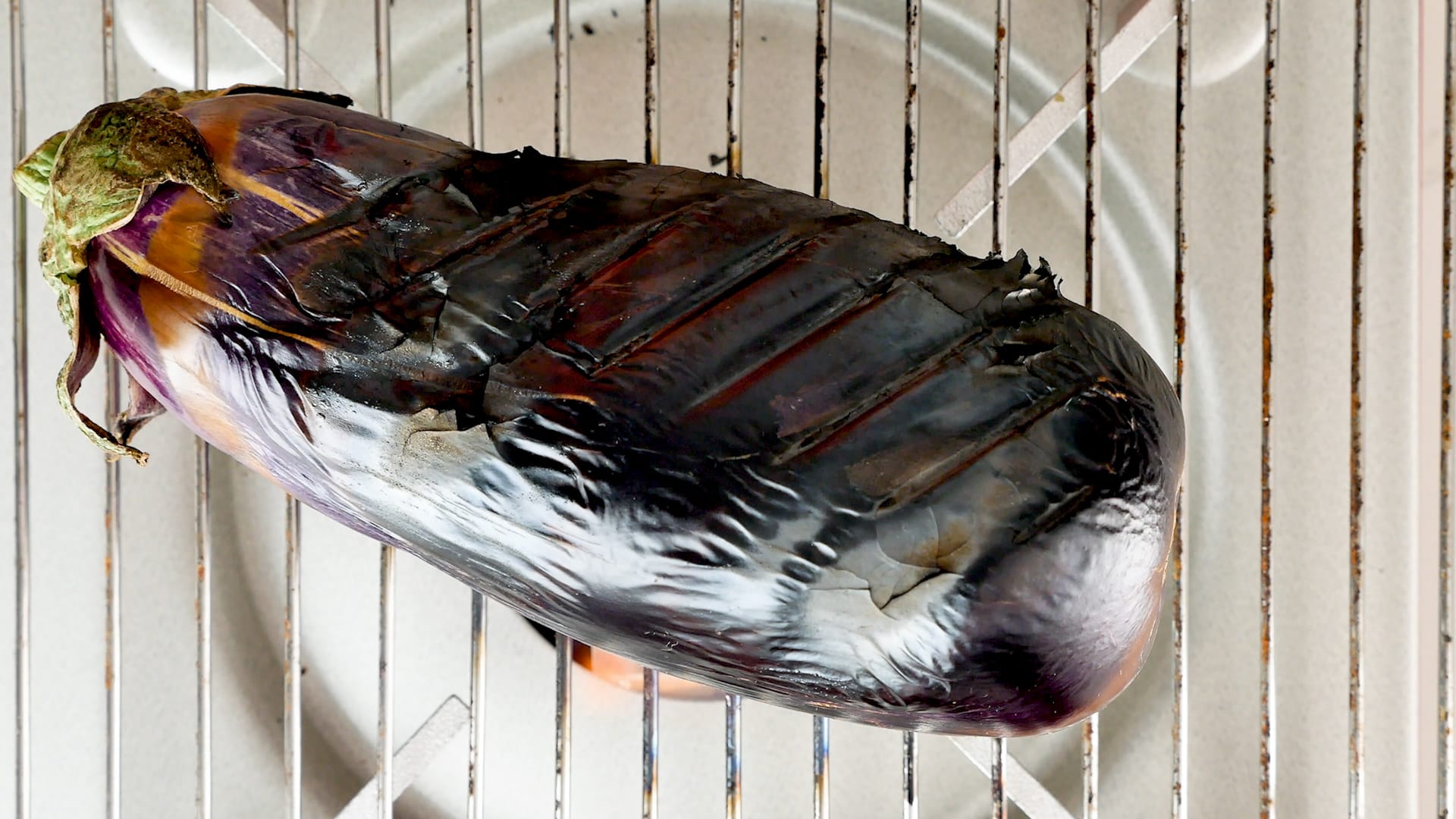 Roasting eggplants.