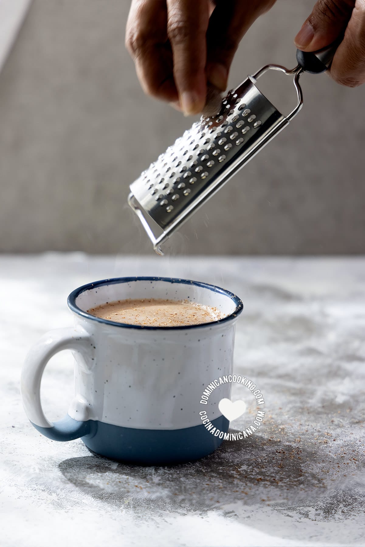 Grating nutmet into peanut "cocoa".