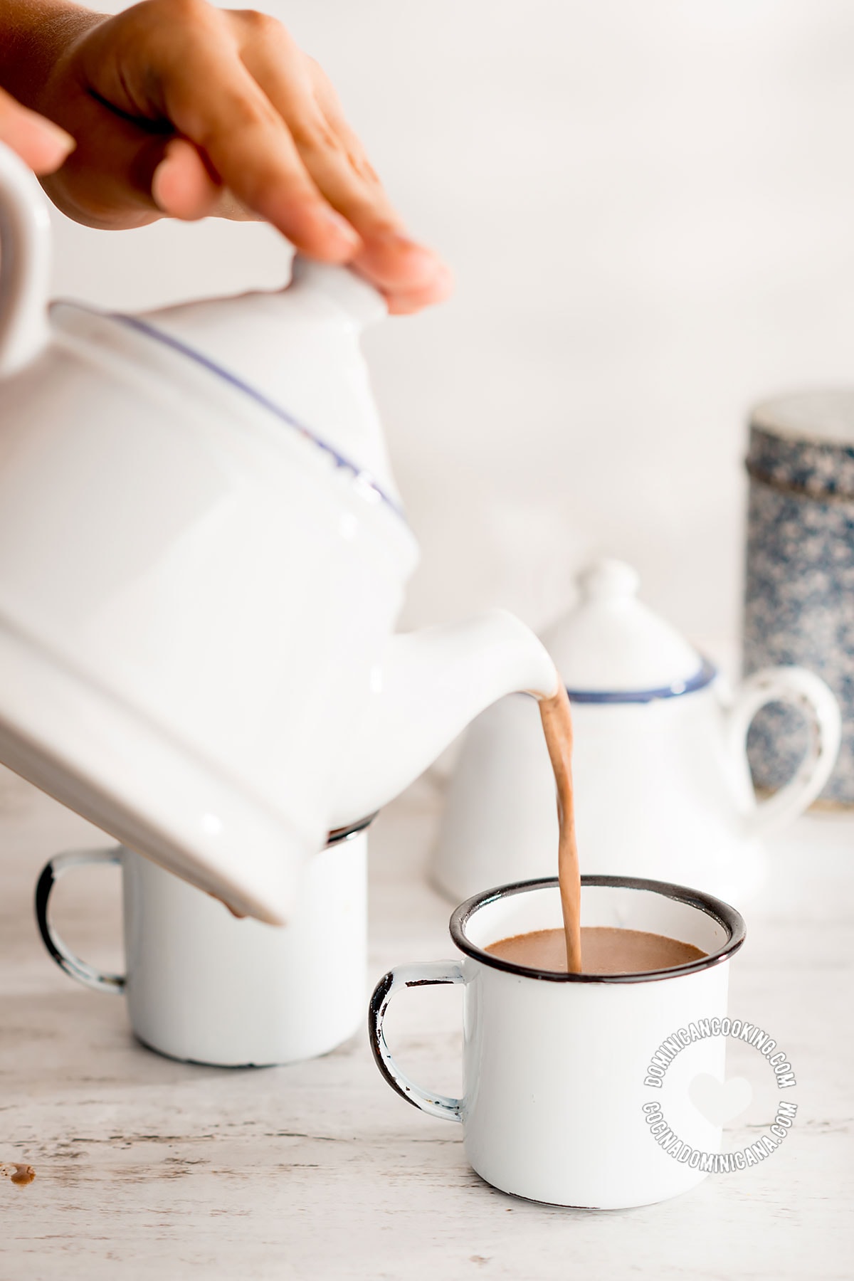 Pouring chocolate espeso (creamy spiced hot cocoa).
