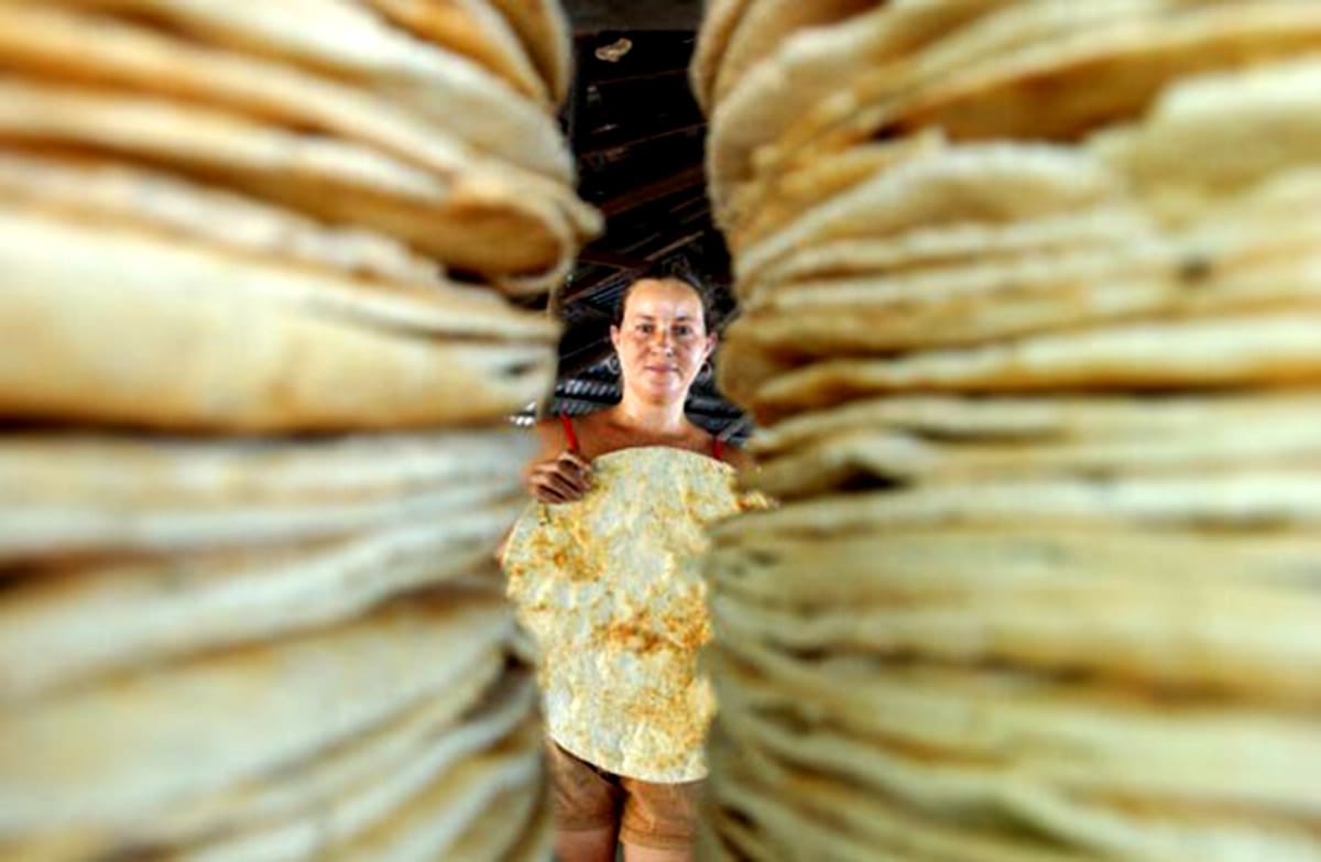 Lady making casabe.