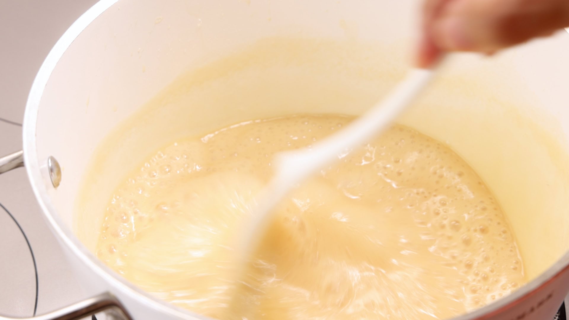 Stirring milk.