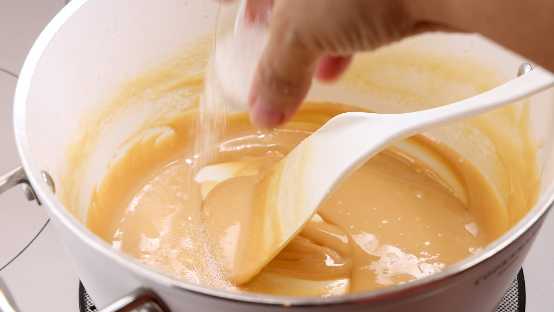 Adding sugar.