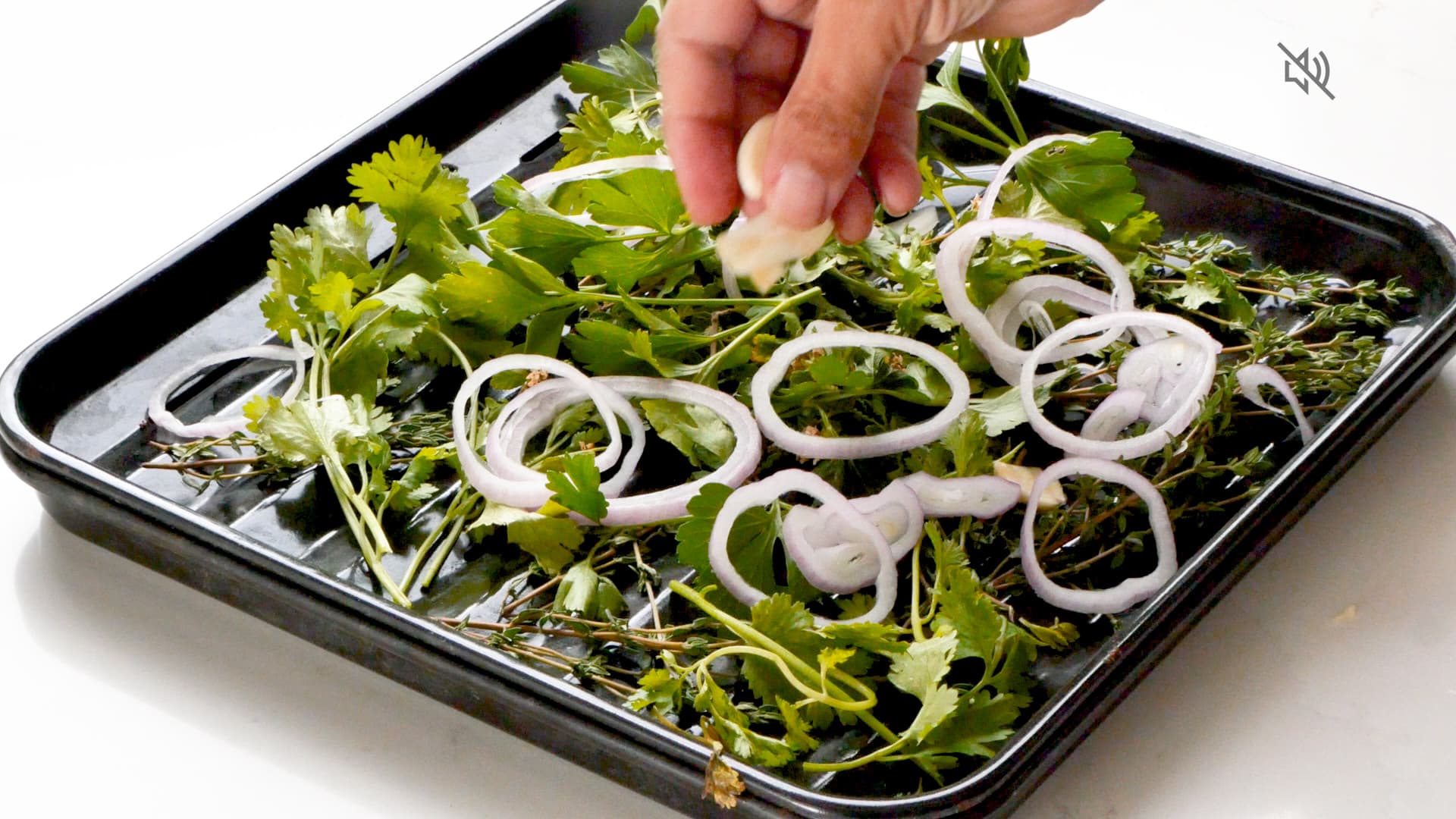 Setting ingredients on tray.