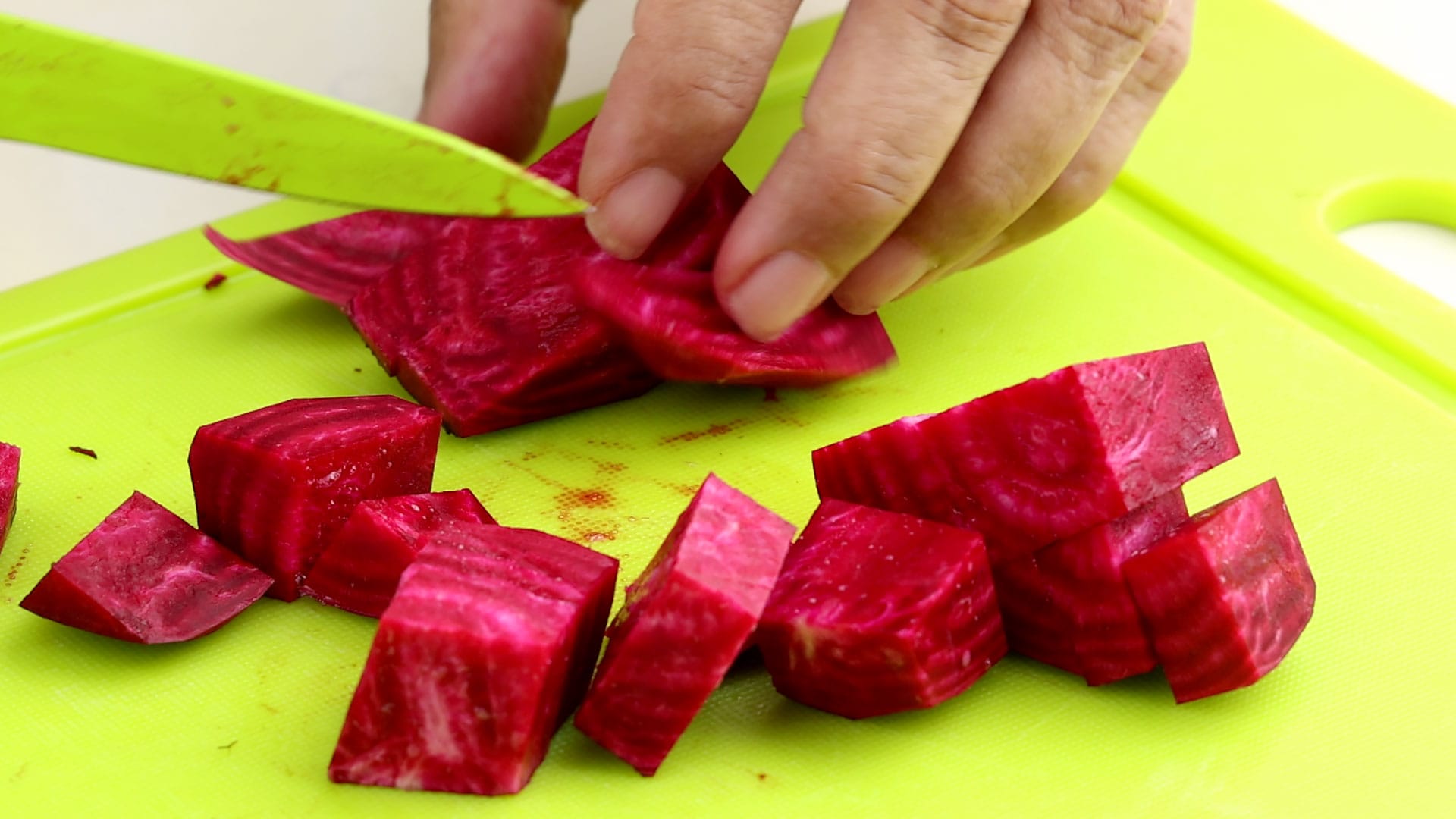 Peeling and chopping the beetroot.