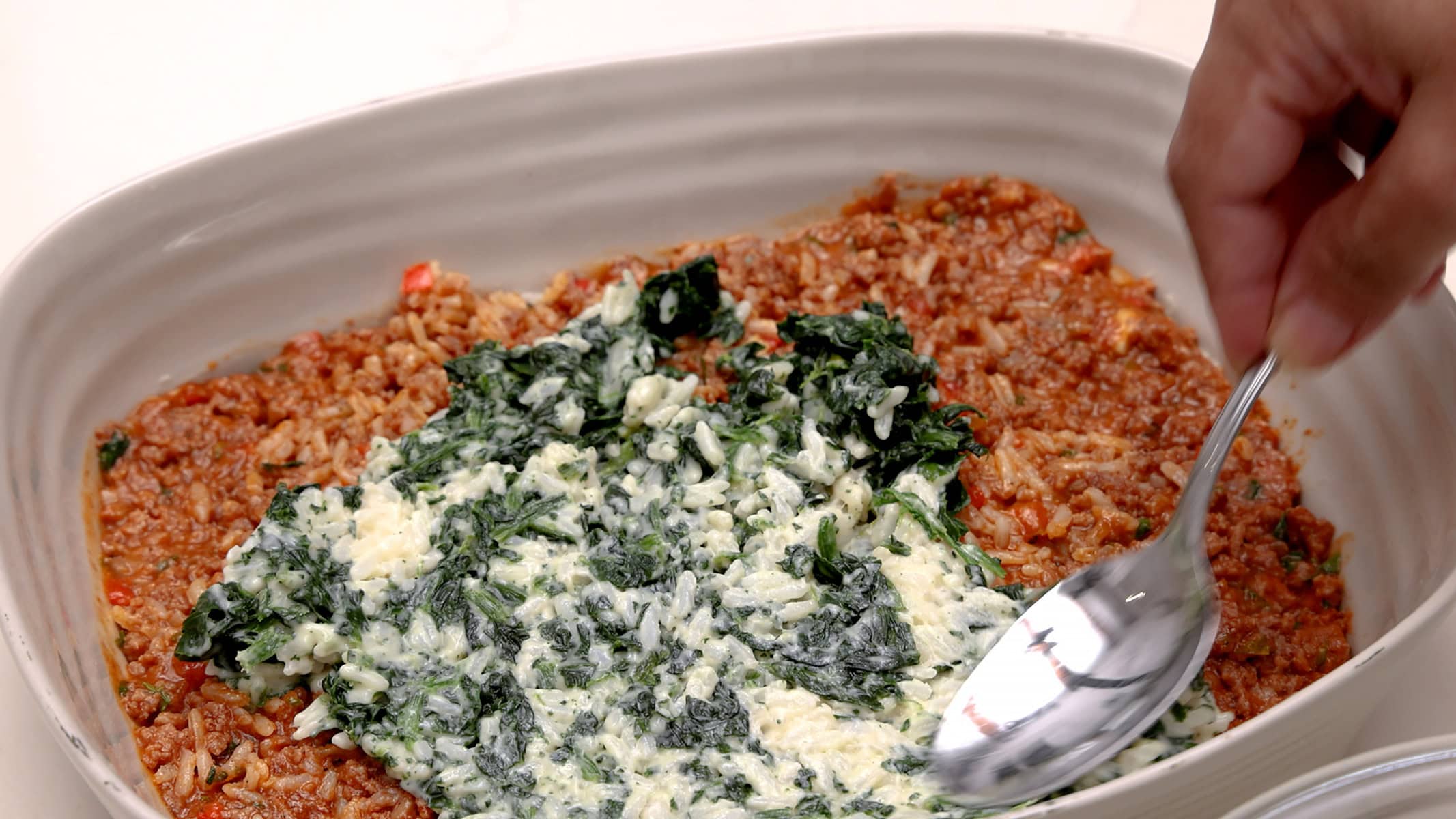 Layering rice.