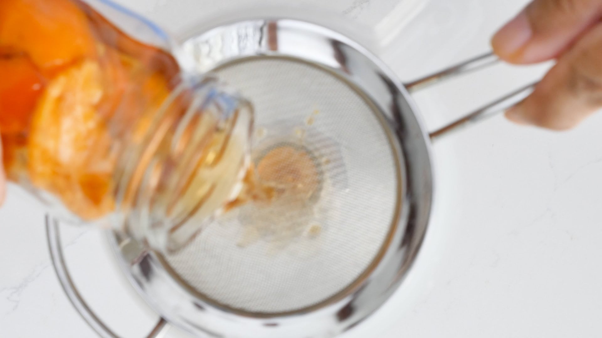 Straining the rum