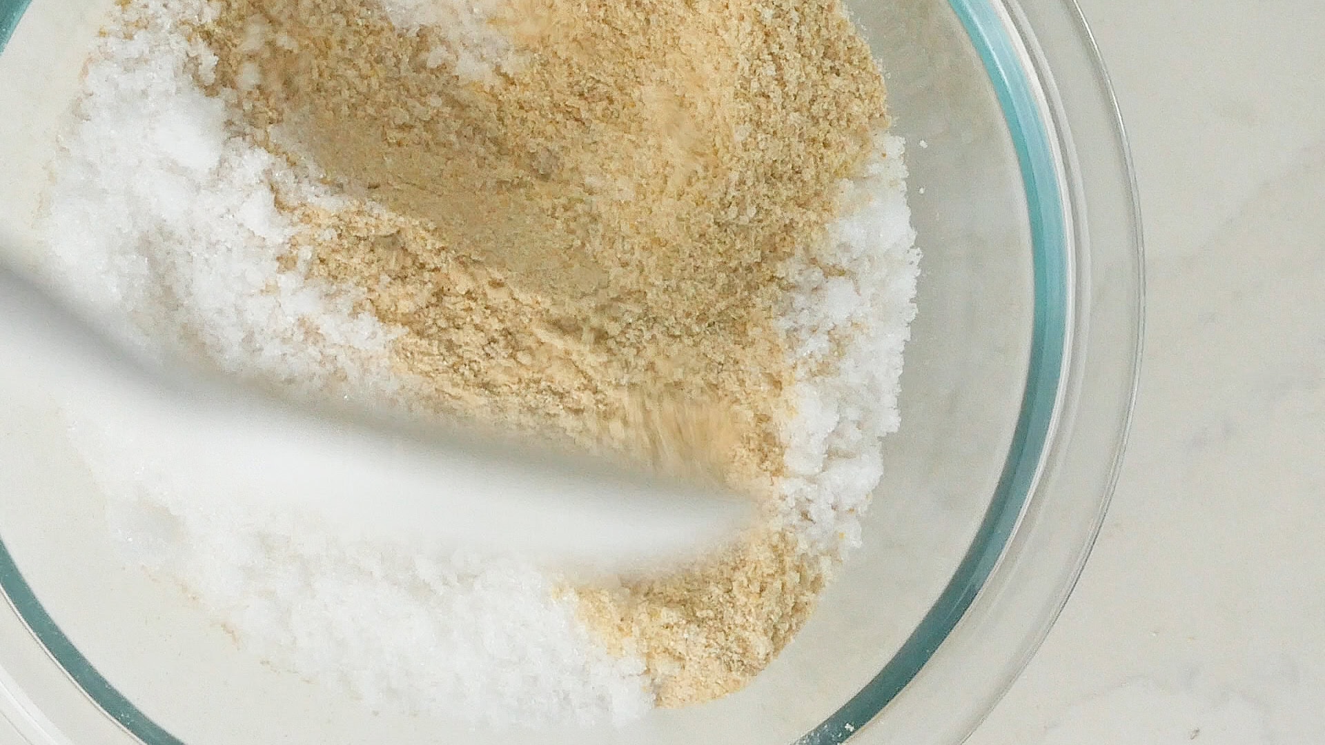 Mixing with sugar.