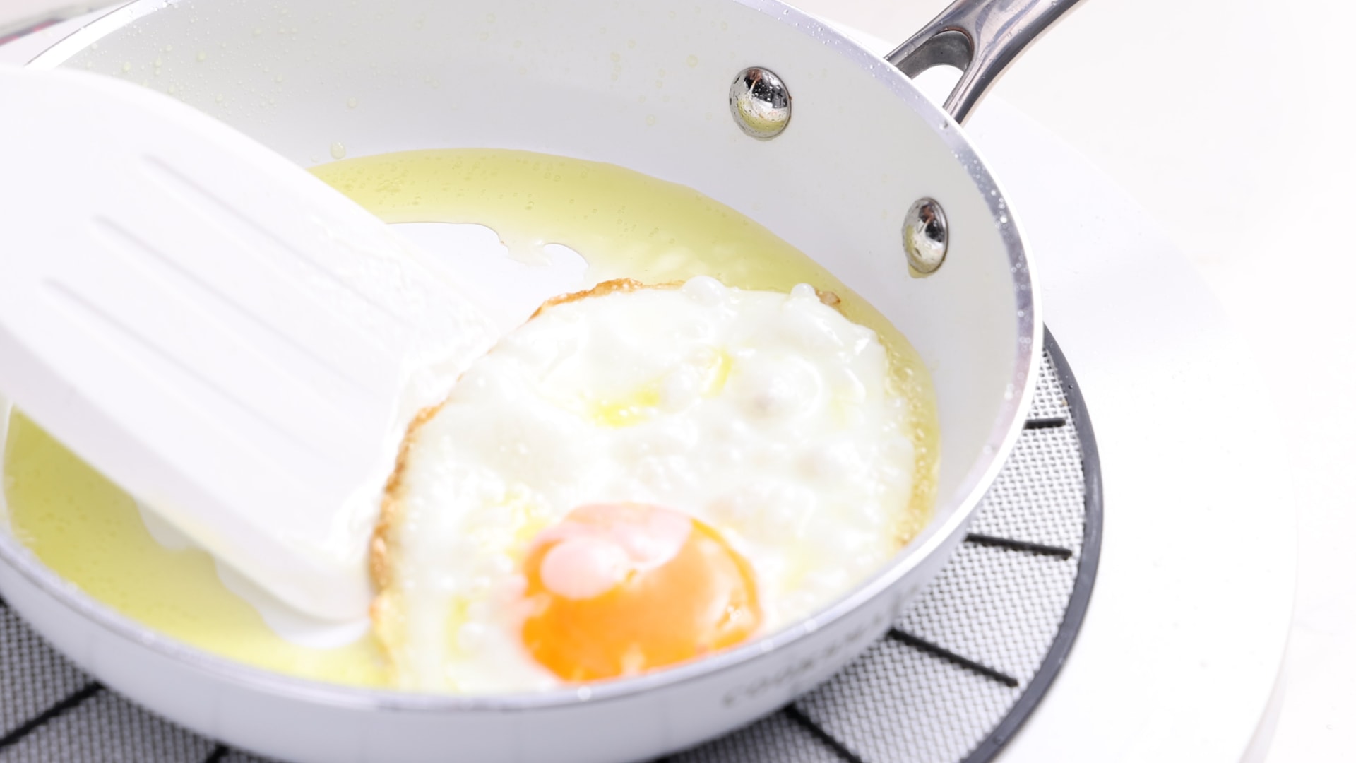 Frying eggs.