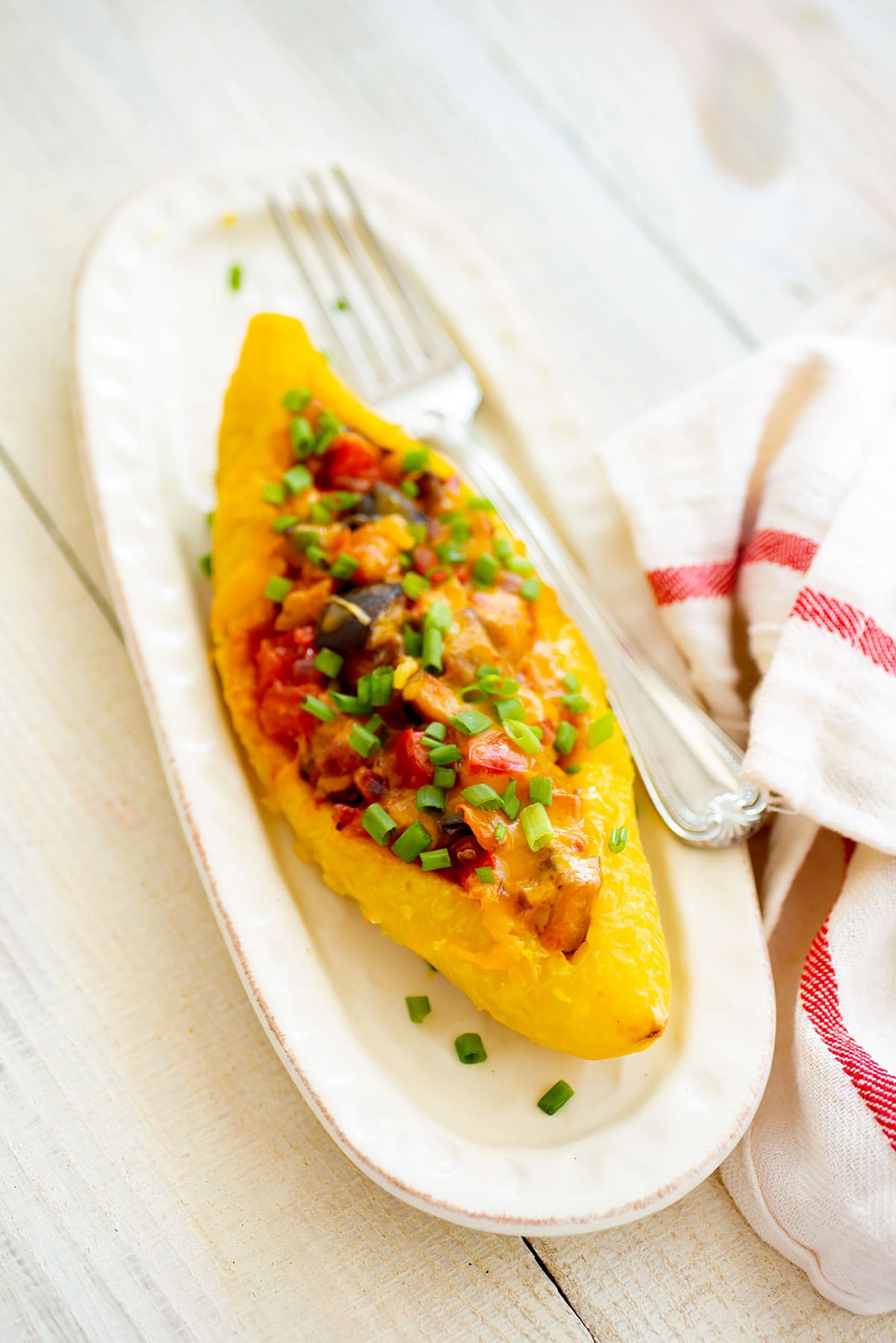 Ripe plantain boats (canoas) with eggplants.