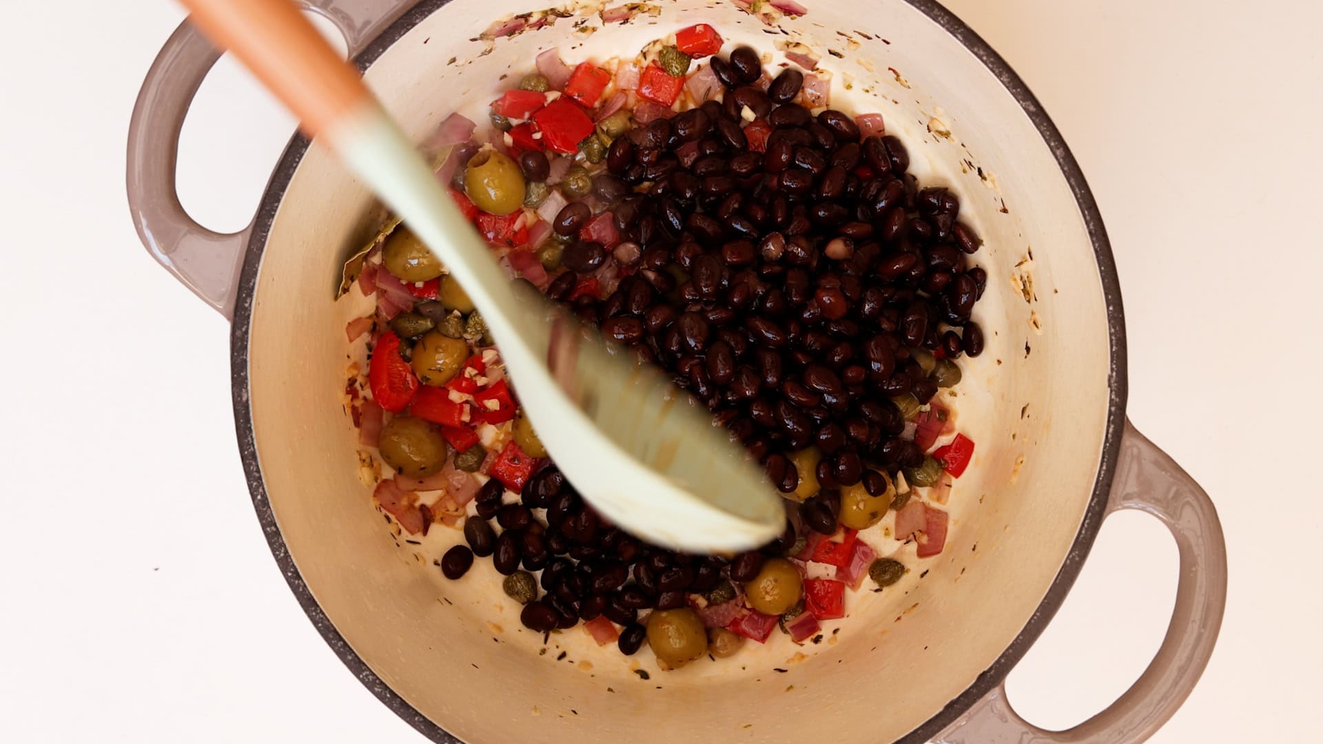 Sauteing beans.