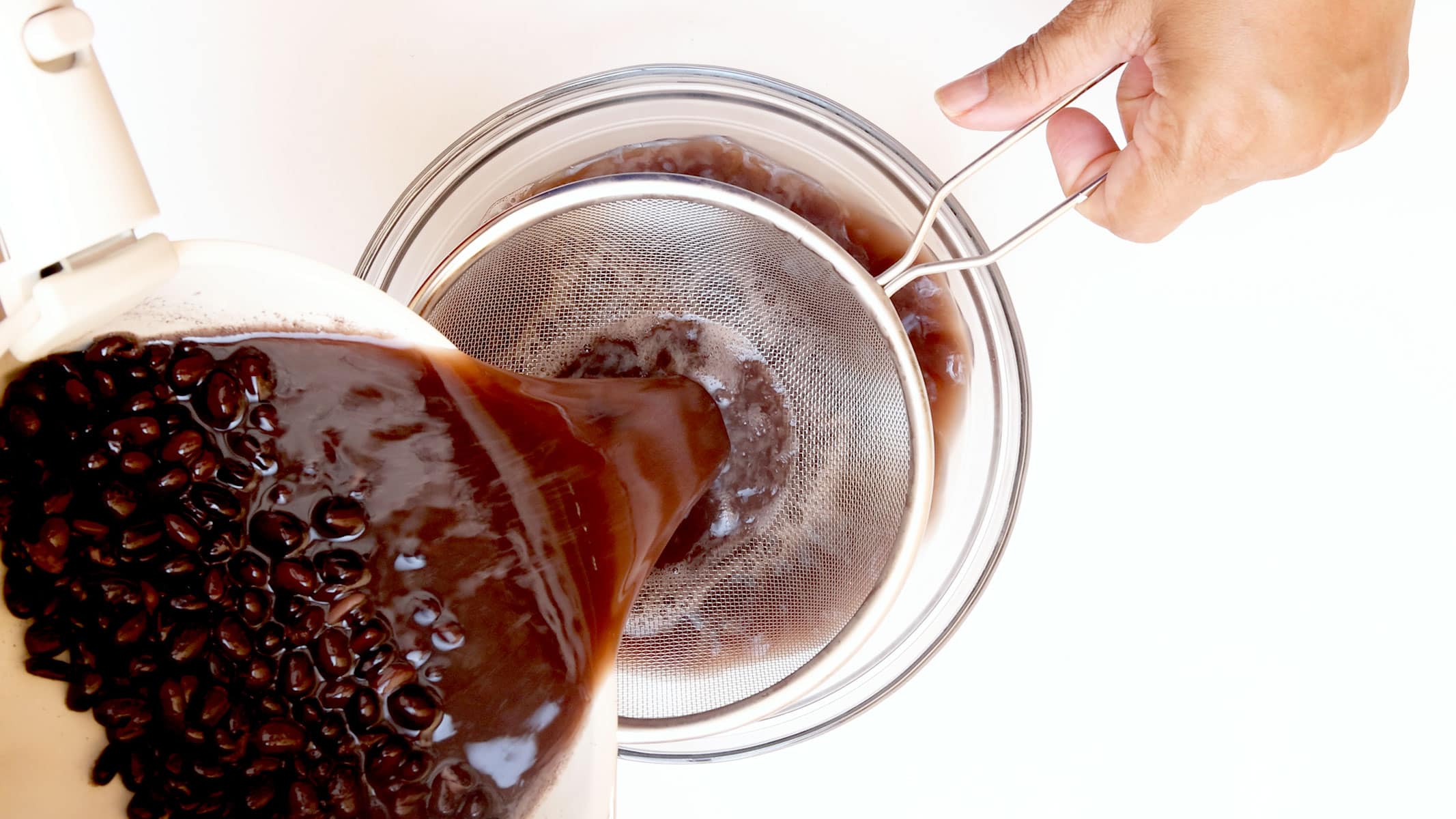 Draining beans.